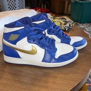 Barely used Air Jordan 1 retro high gold medal